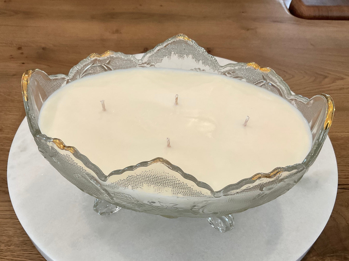 Vintage crystal bowl with gold accent candle