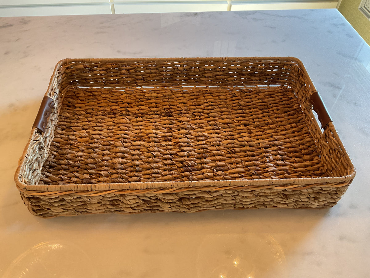 Large rattan basket with leather handles
