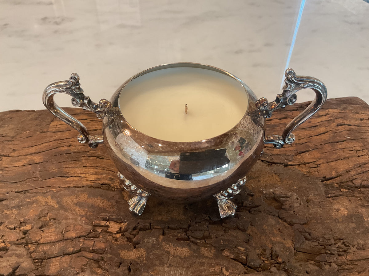Antique sliver candle with legs and handles