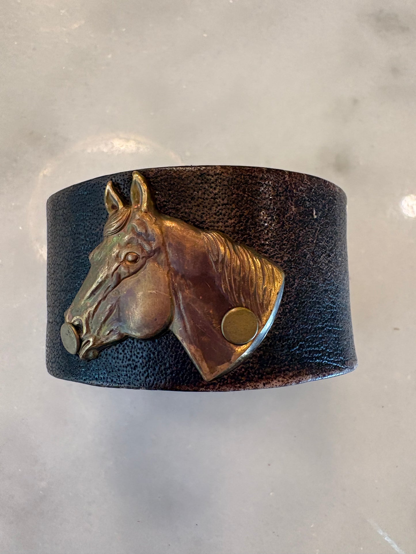 Leather cuffs, assorted designs