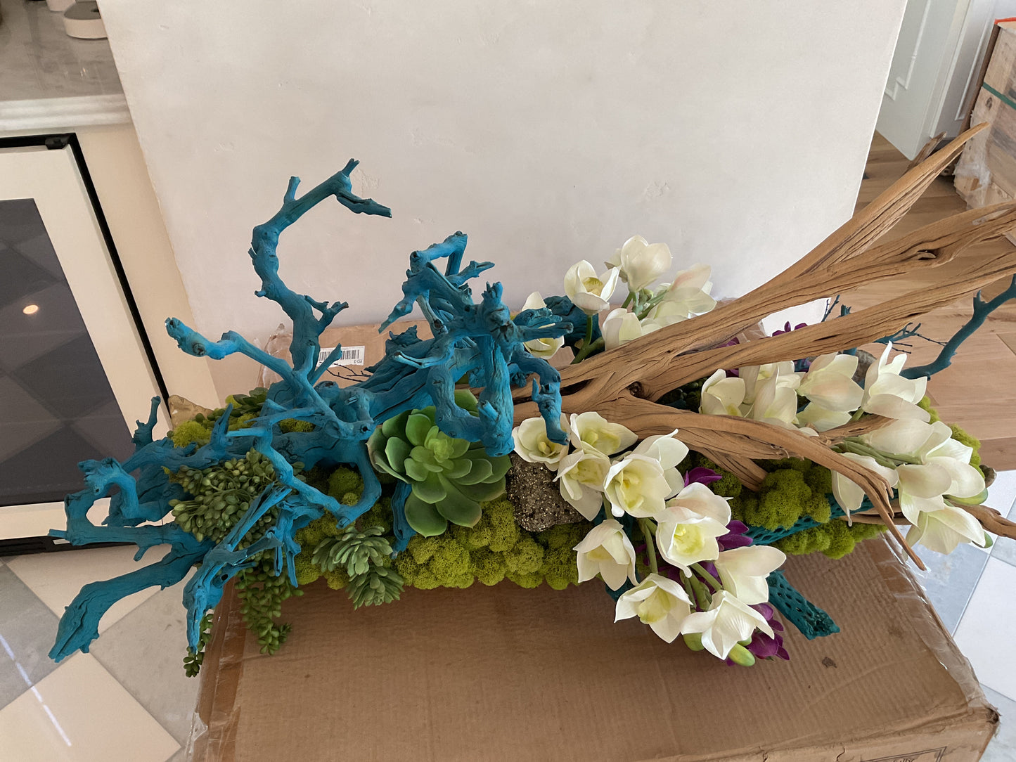 Teal driftwood moss centerpiece