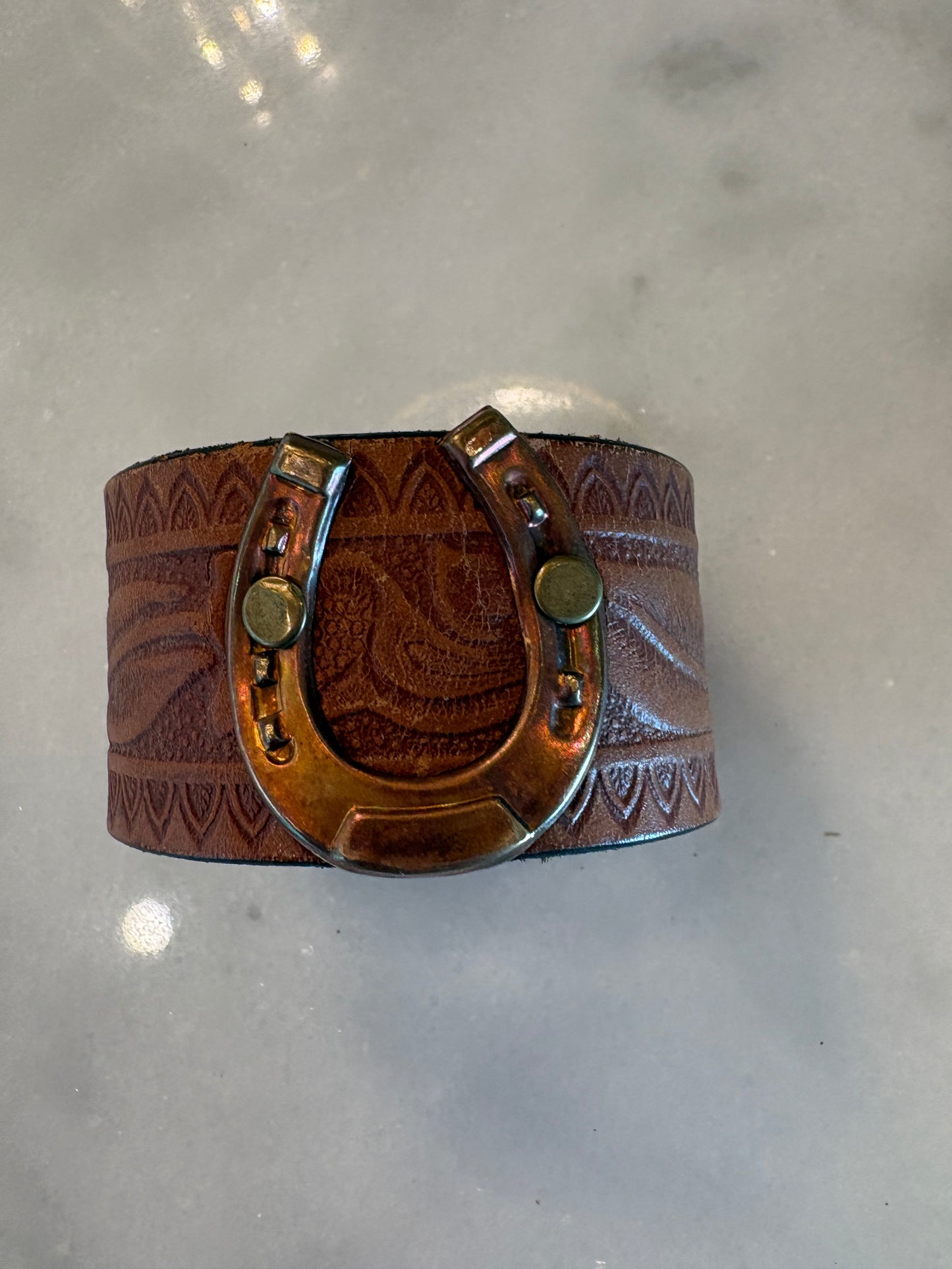Leather cuffs, assorted designs