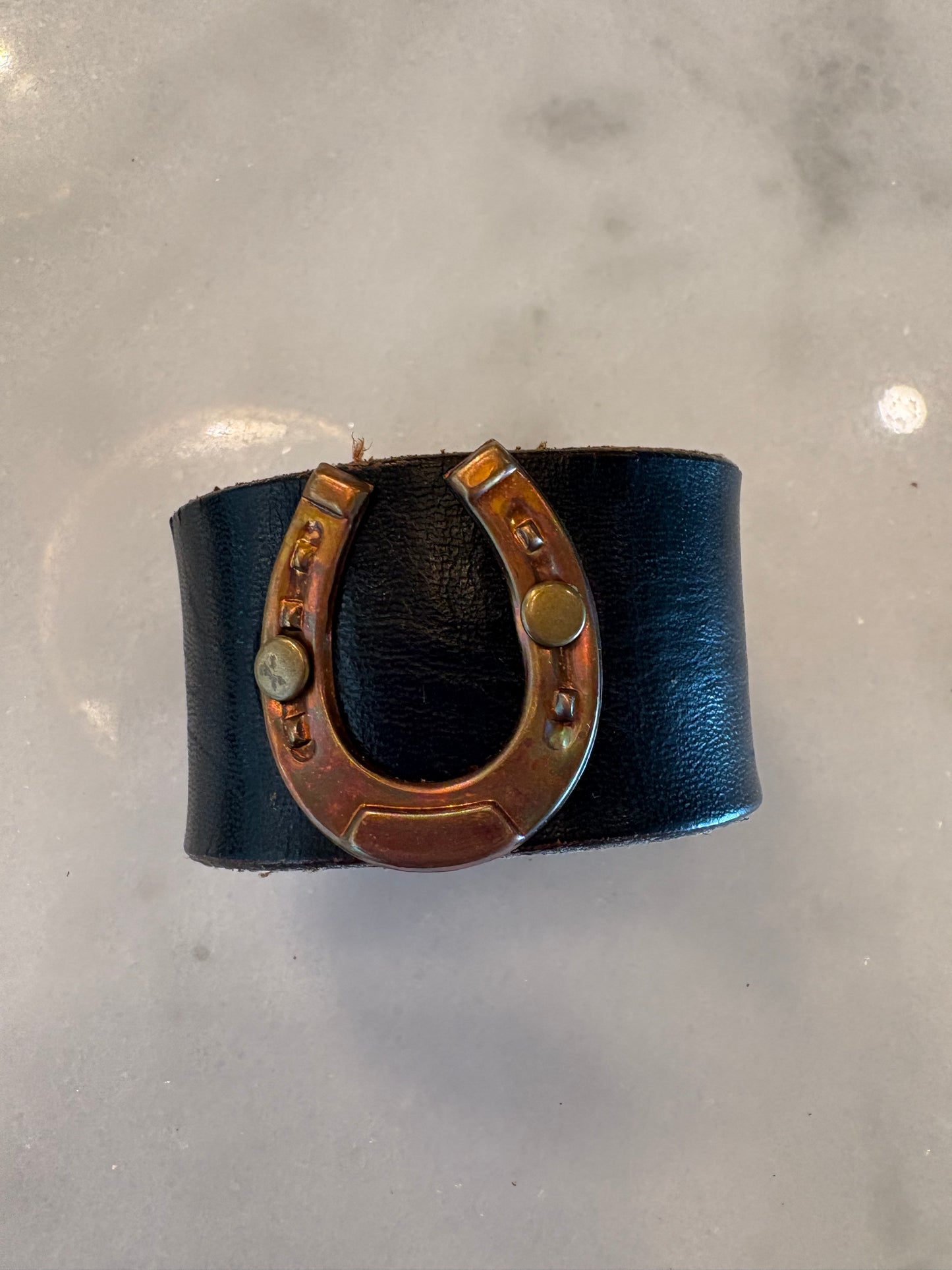 Leather cuffs, assorted designs