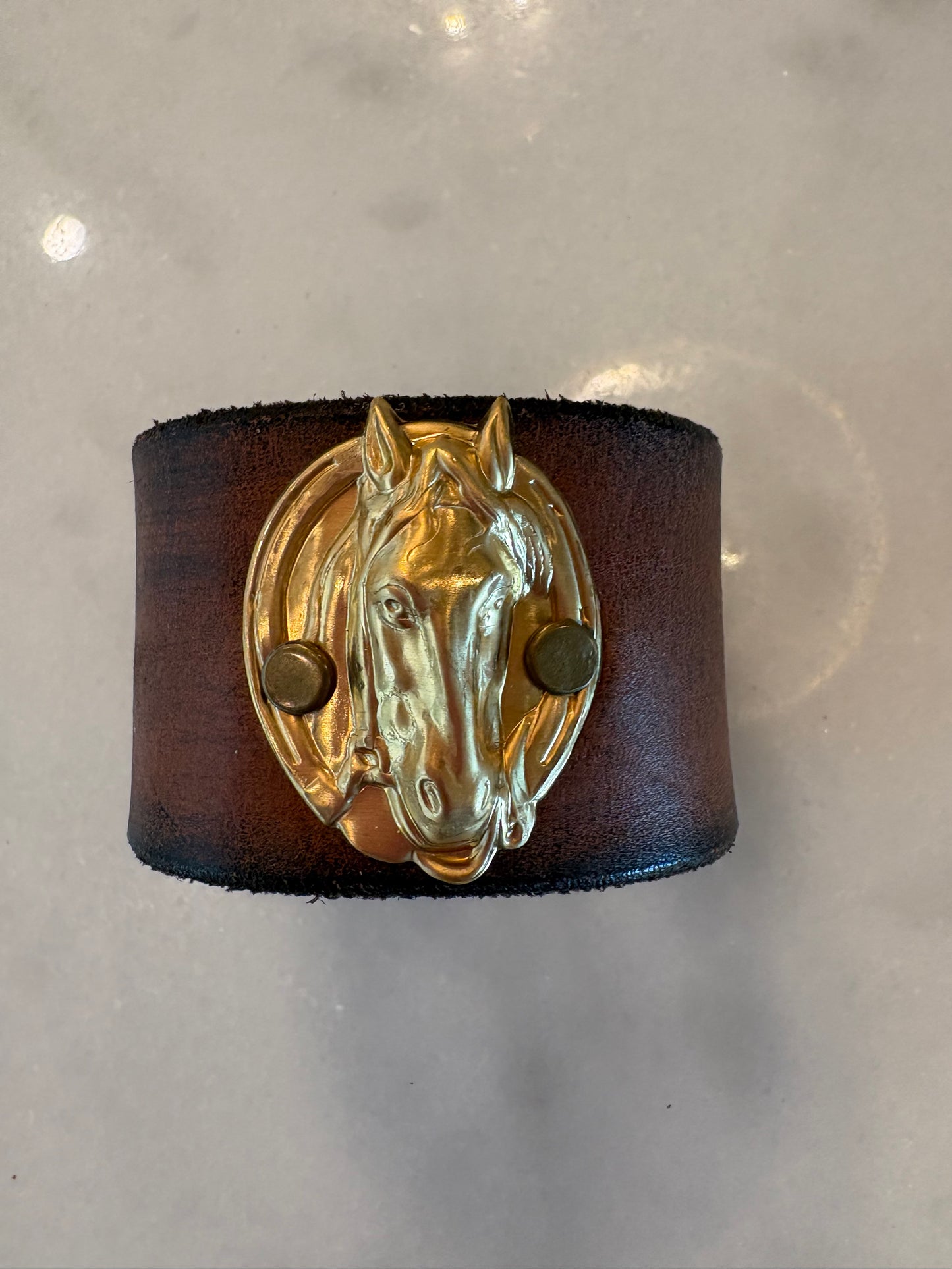 Leather cuffs, assorted designs