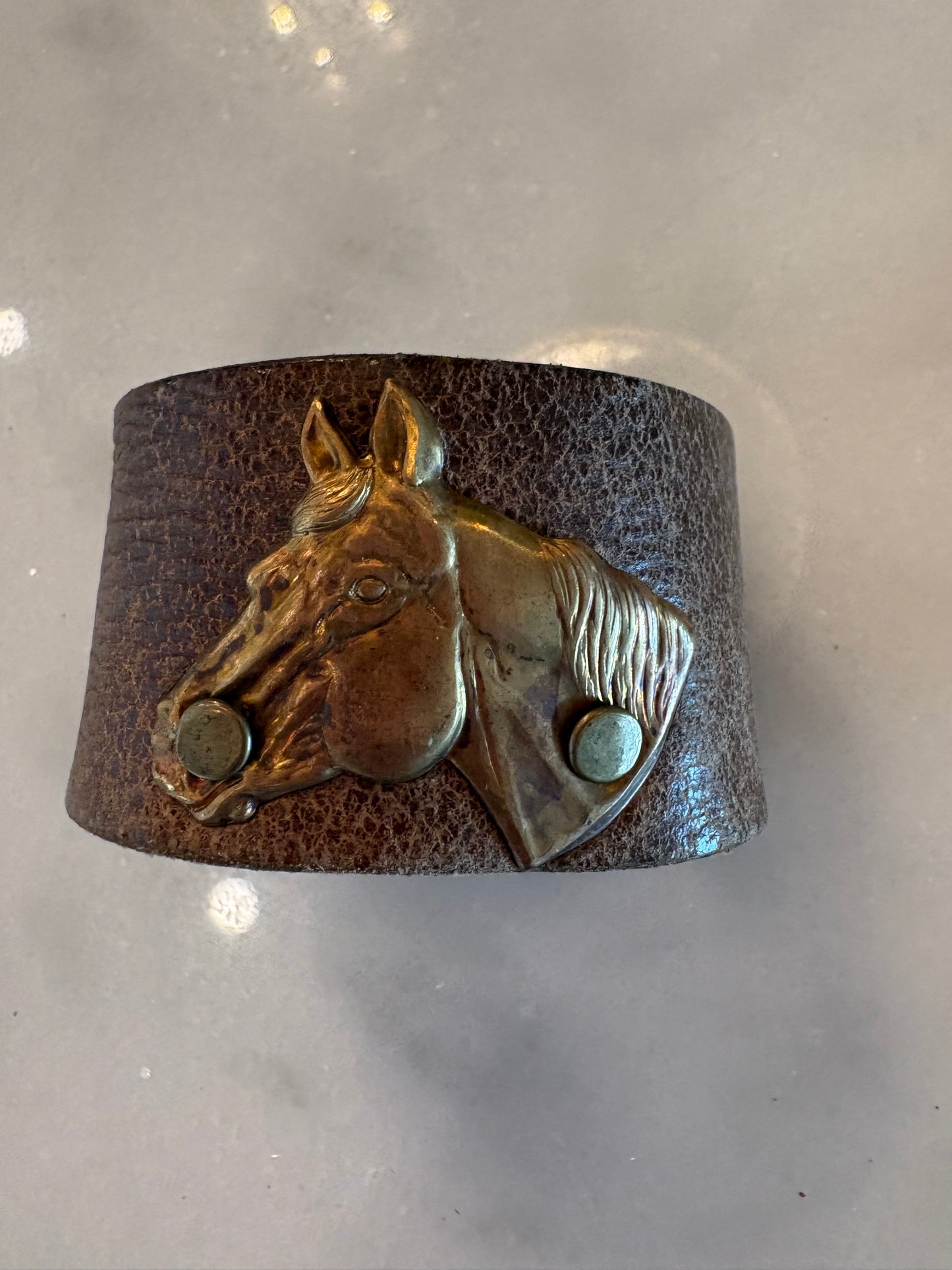 Leather cuffs, assorted designs