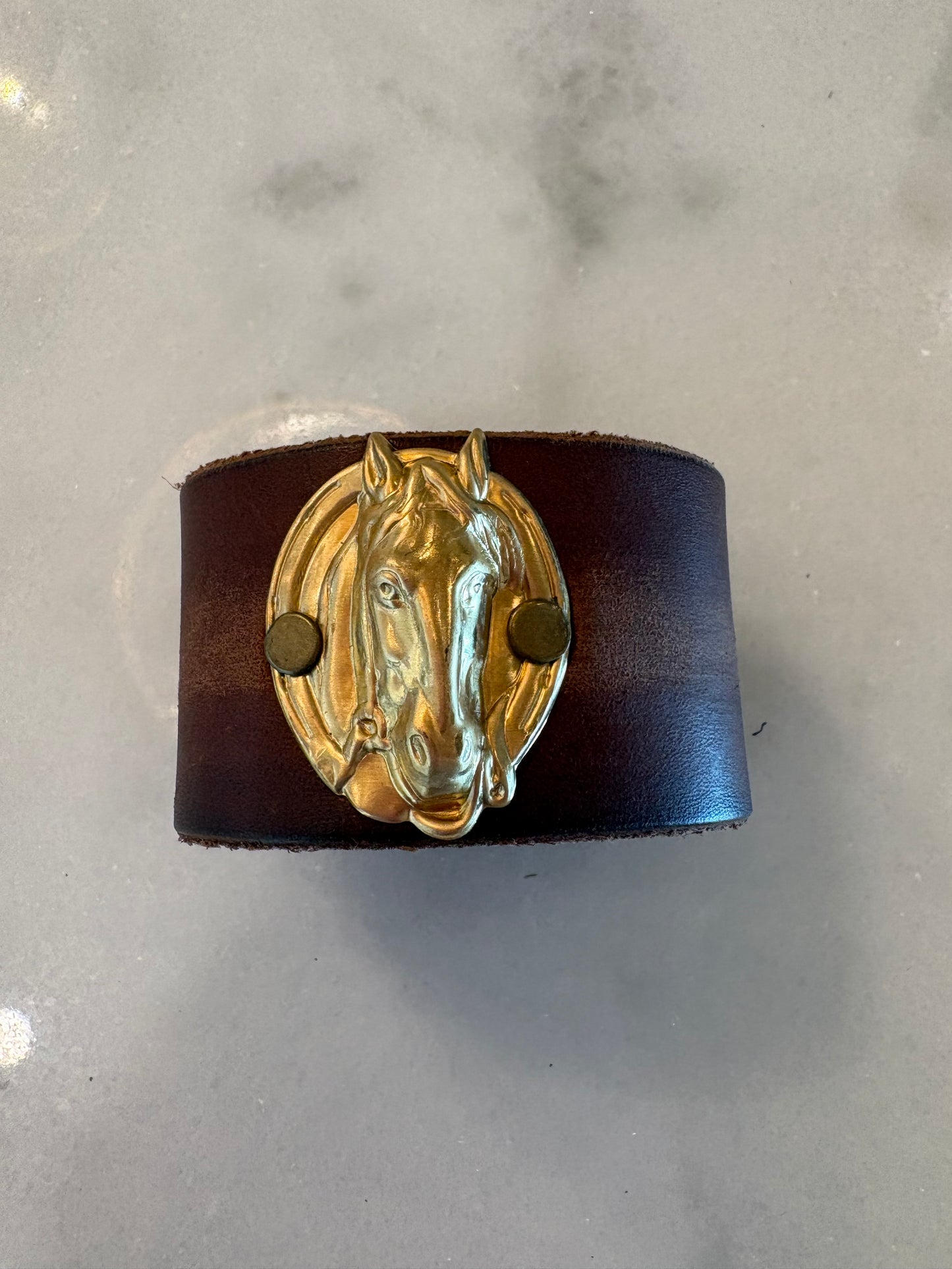 Leather cuffs, assorted designs