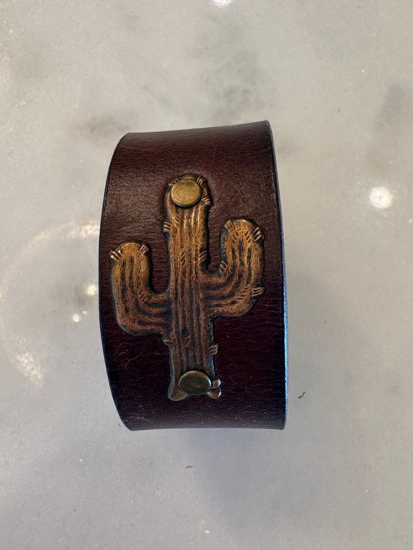 Leather cuffs, assorted designs